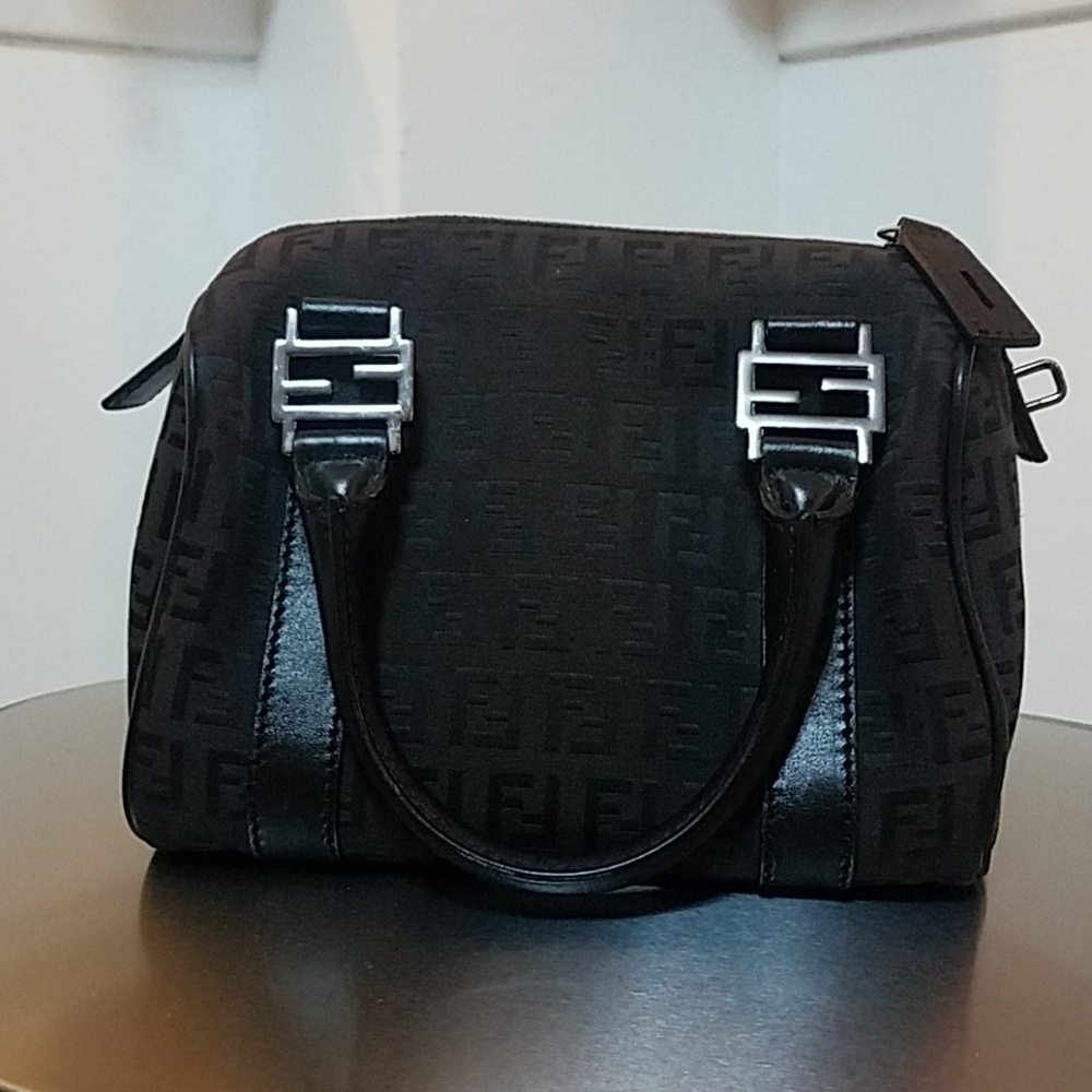 Authentic Fendi mini bag. No dust bag lock or key.